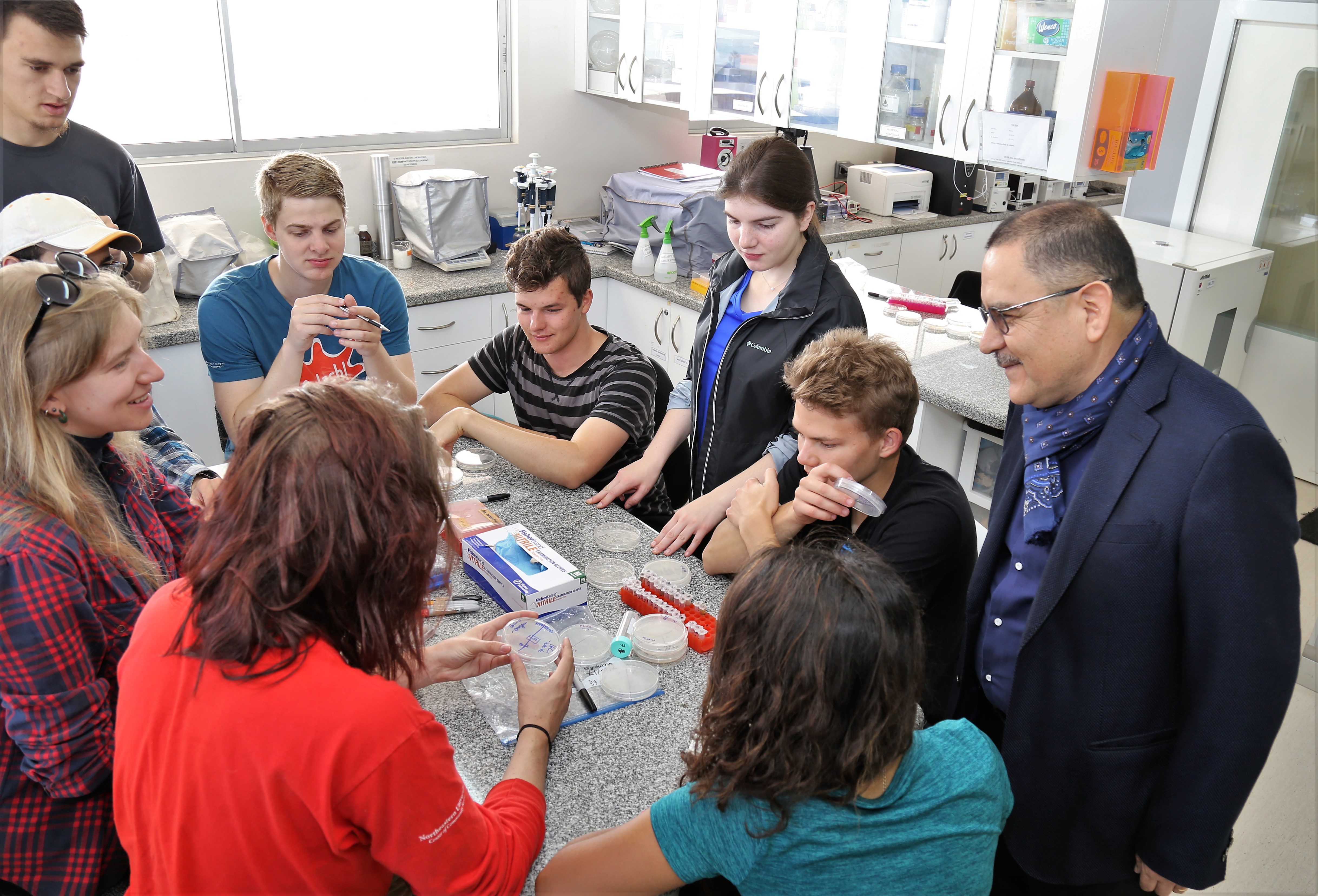 Students discuss research.