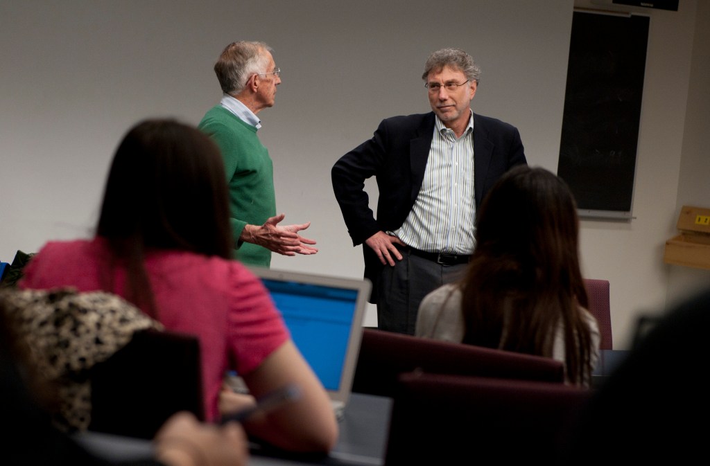 Journalism professor Nicholas Daniloff introduces Martin Baron, editor of The Boston Globe, to his ethics class.