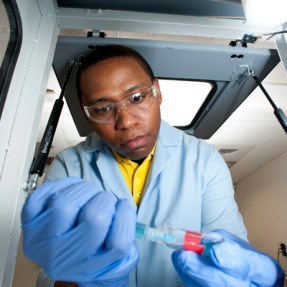 man holding syringe