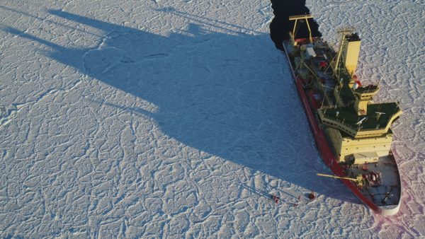 The Nathaniel B. Palmer smashing through ice in the Antarctic ocean. Photo by Guy Williams, University of Tasmania.