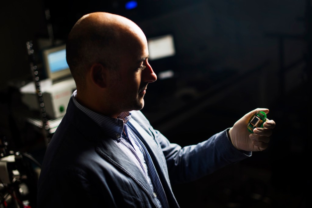 Matteo Rinaldi has developed a new type of sensor that consumes no power whatsoever in standby mode, waking up only when it detects an important event. Photo by Adam Glanzman/Northeastern University