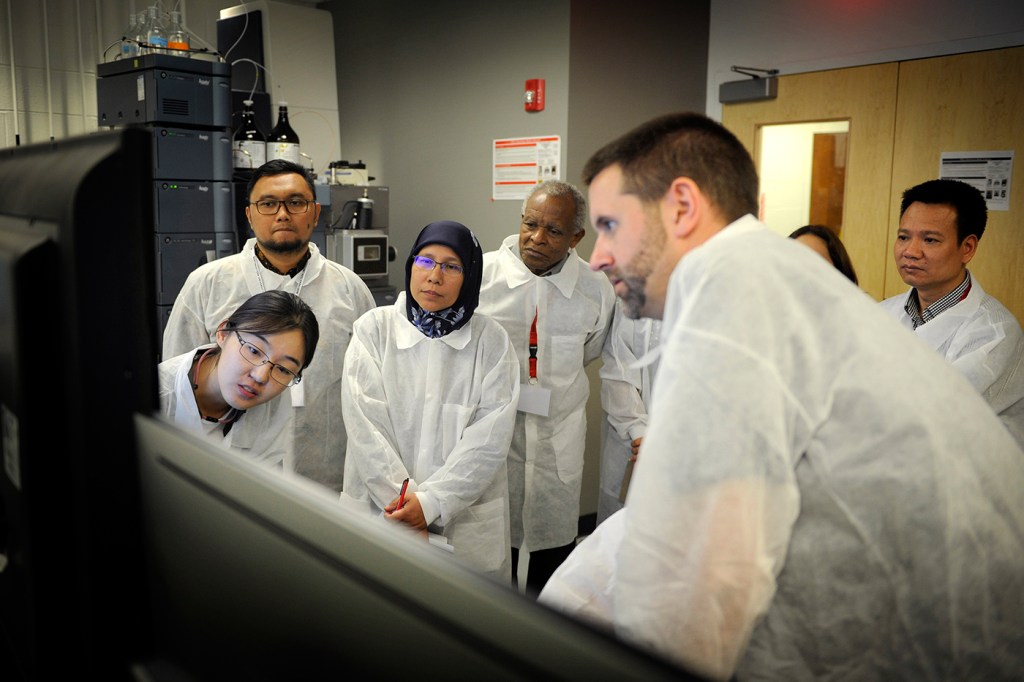 Jared Auclair, director of Northeastern’s Biotechnology Professional Science Masters and Training, leads an APEC Biotherapeutics Centers of Excellence pilot training at Northeastern’s Innovation Campus. Photo by: Matthew Modoono/Northeastern University