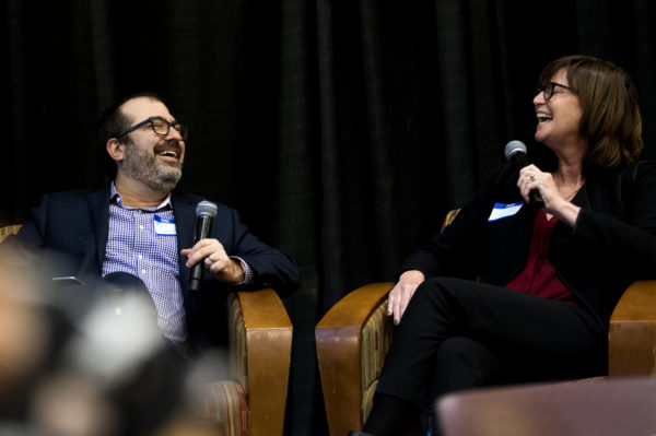 Eric Umansky, deputy managing editor of ProPublica and Louise Kiernan, editor-in-chief of ProPublica Illinois, participated in the afternoon's keynote panel, moderated by Jonathan Kaufman, director of the Northeastern School of Journalism. They joined the ranks of a host of other journalists representing radio, television, online, startup, and print news organizations throughout the country at the event held in the Cabral Center. Photo by Matthew Modoono/Northeastern University