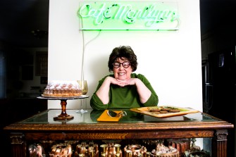 Marilynn Brass poses in her Cambridge home