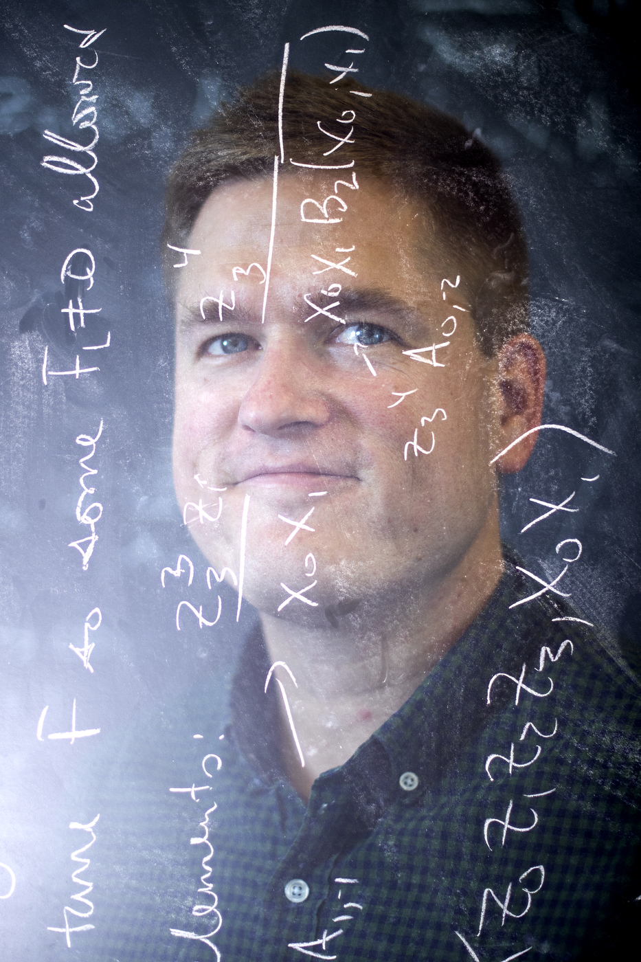 “String theory is not a settled subject,” says James Halverson, an assistant professor of physics at Northeastern. “This is a complex problem, so we need not just modern techniques from mathematics, but also modern techniques from computer science.” Photo by Matthew Modoono/Northeastern University