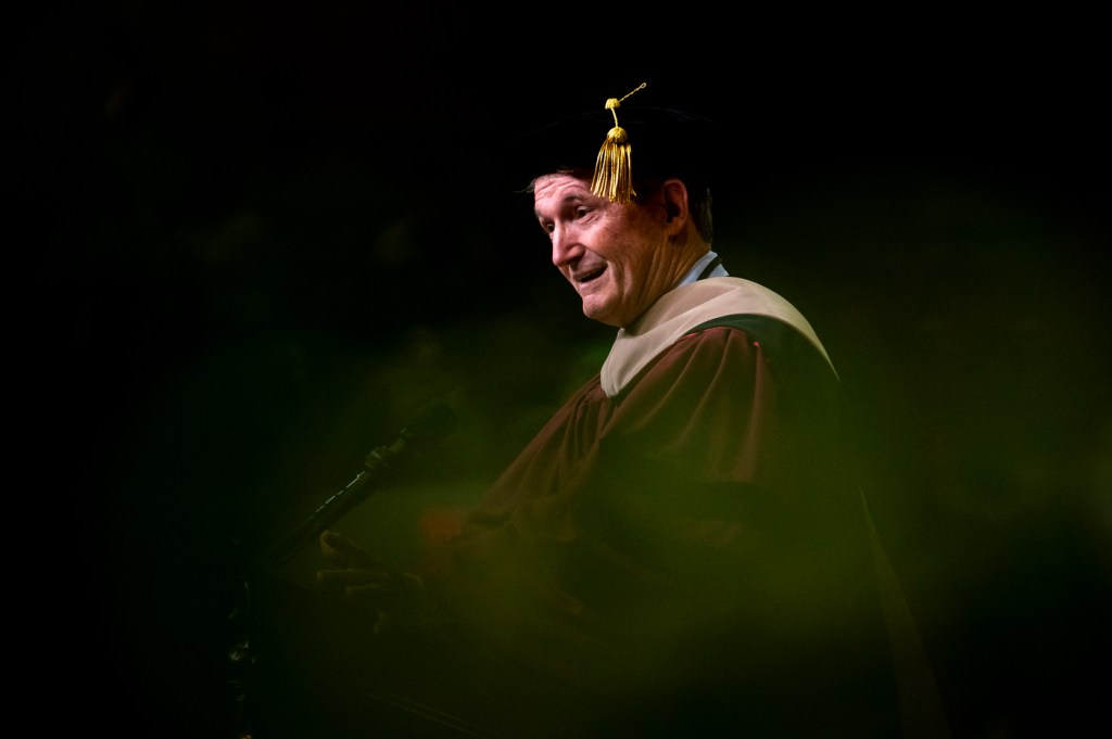 Go the extra mile to help family, friends, and colleagues, Bob Davis, a venture capitalist who co-founded one of the internet’s first search engines, told graduates of Northeastern’s D’Amore-McKim School of Business on Wednesday. “You will be amazed at how your career will fly as people take notice,” he said. Photo by Ruby Wallau/Northeastern University