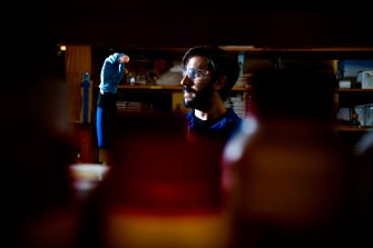 David Medina, a doctoral student at Northeastern, is using bacteria to produce nanoparticles that are particularly effective at killing whatever type of cell was used to create them, including strains of bacteria that are resistant to traditional antibiotics. Photo by Matthew Modoono/Northeastern University