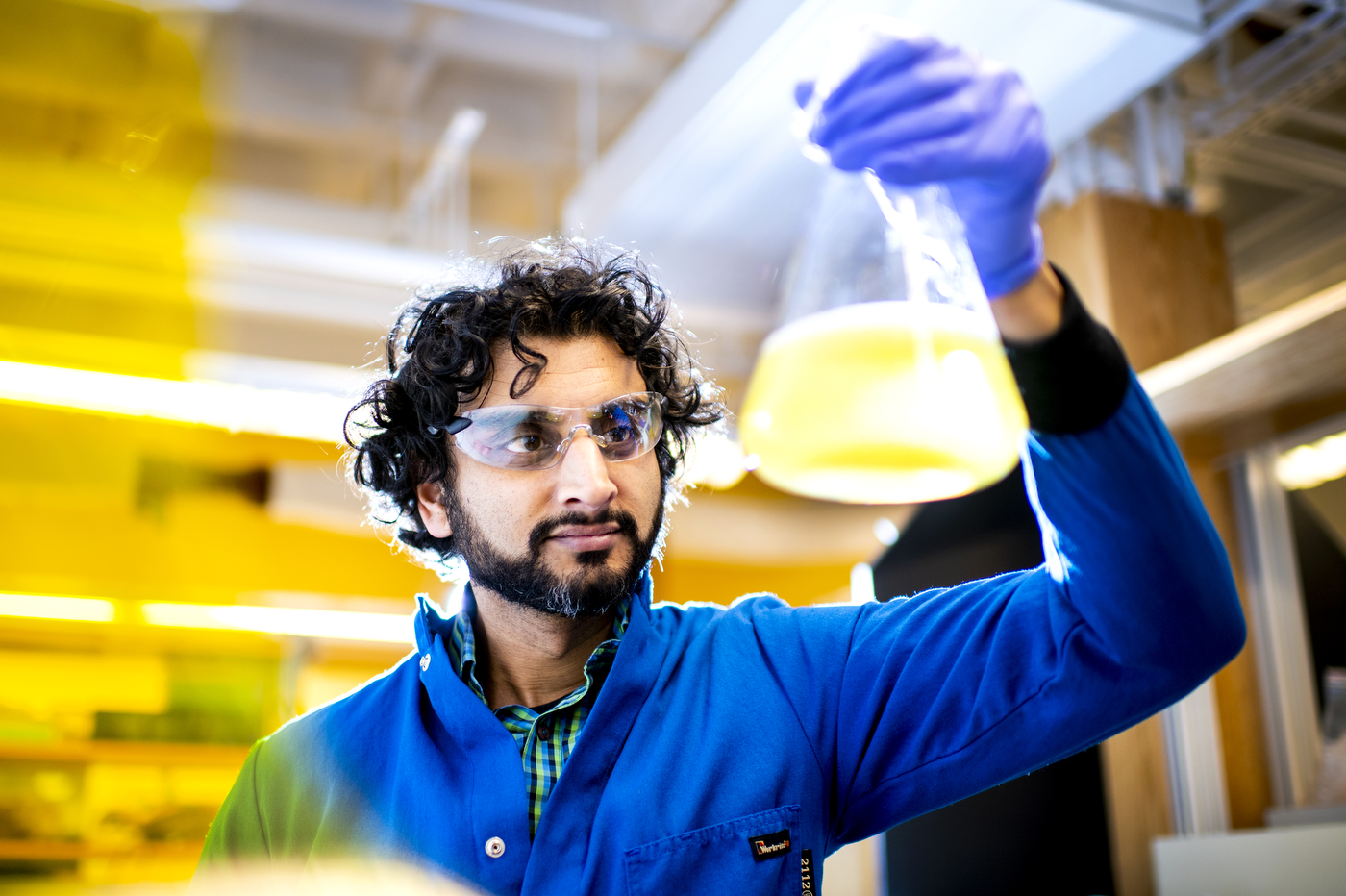 Headshot of Neel Joshi testing for a probiotic pill. 