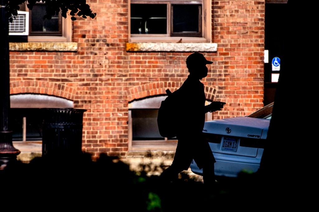 A student walks on campus