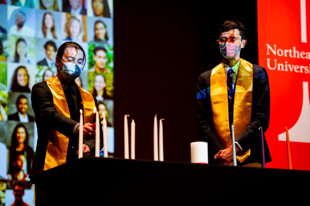 Candles are lit to begin the Huntington 100 ceremony