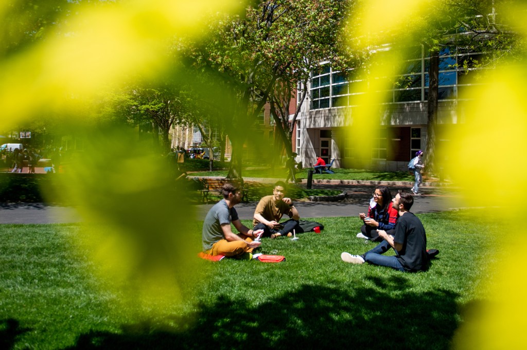 People sitting on campus