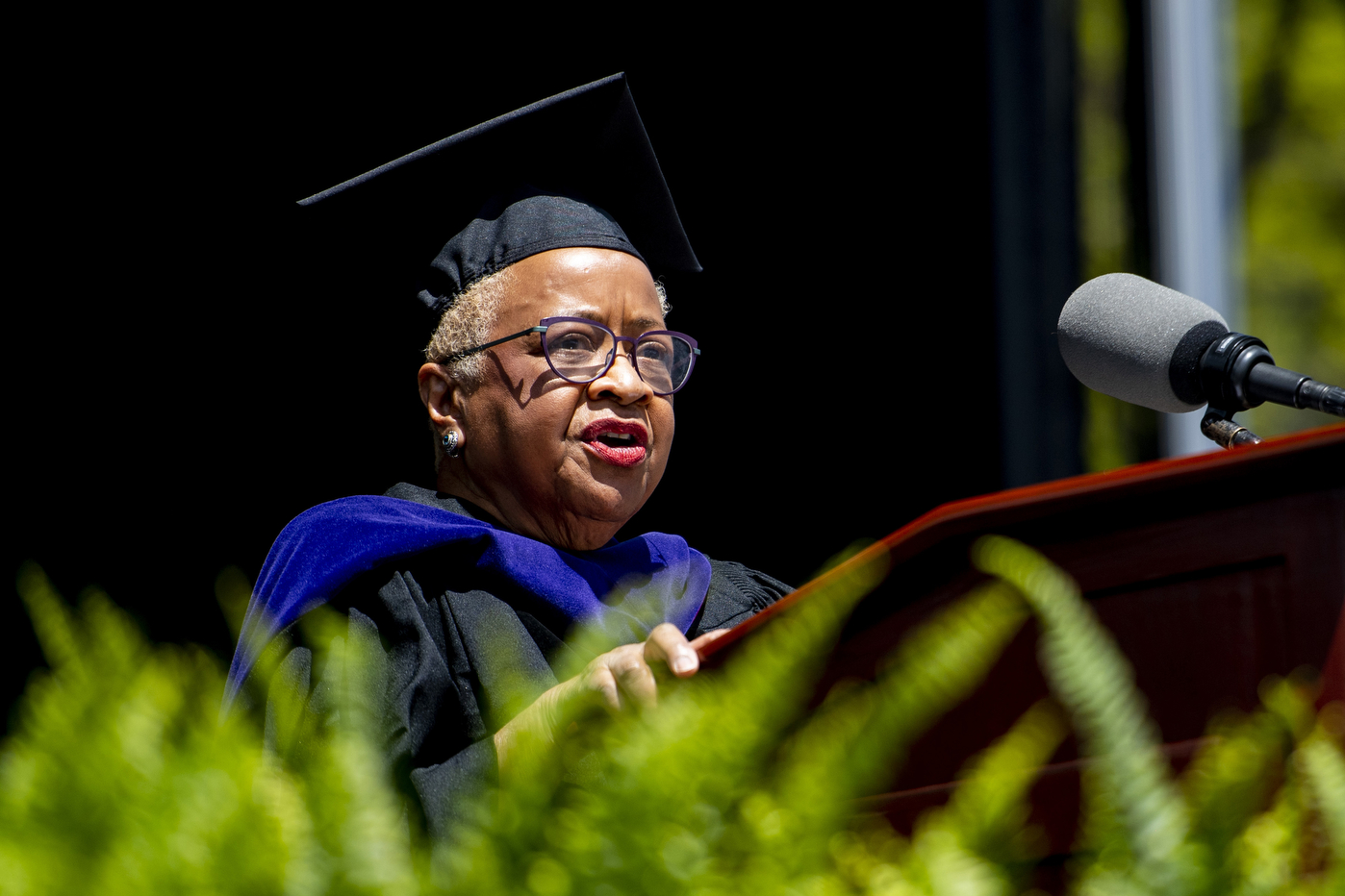 Speaker at lectern