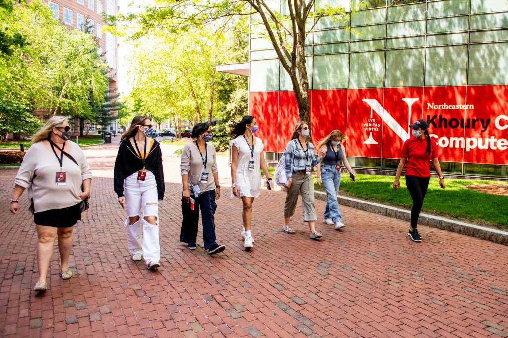 A Northeastern student leads an in-person tour on campus.