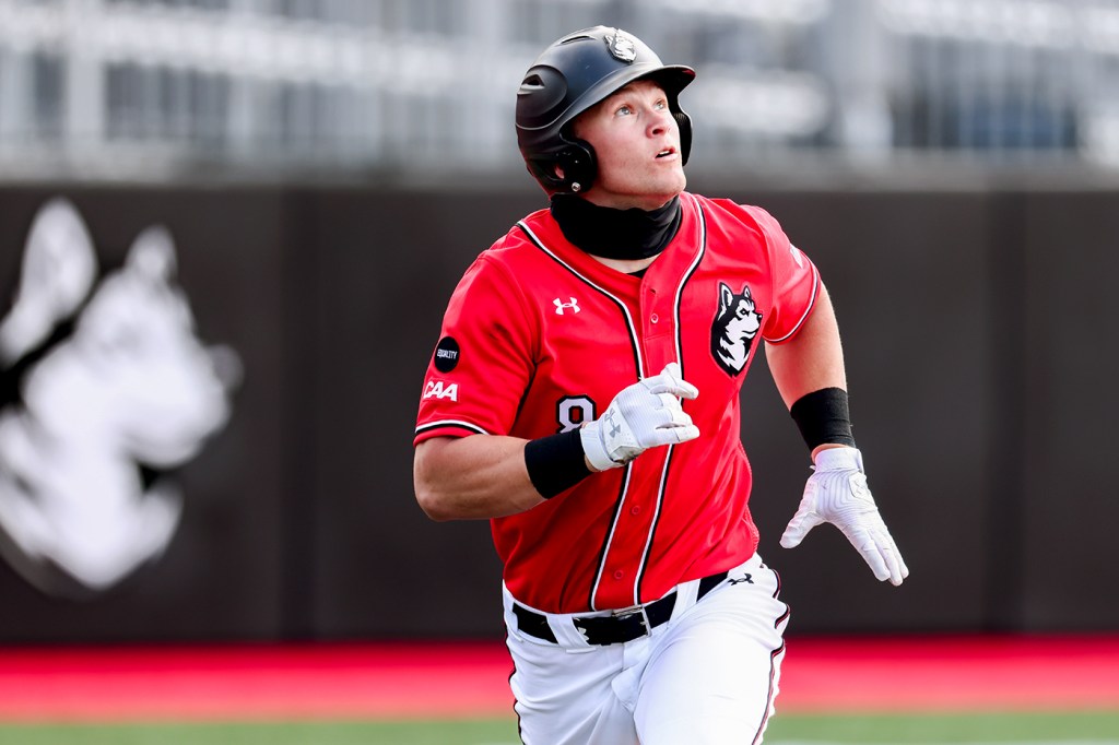 Jared Dupere runs to first base.