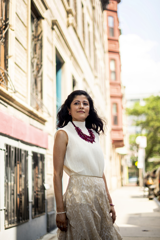 Woman standing on city street