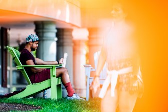 A student reads on the Northeastern campus.