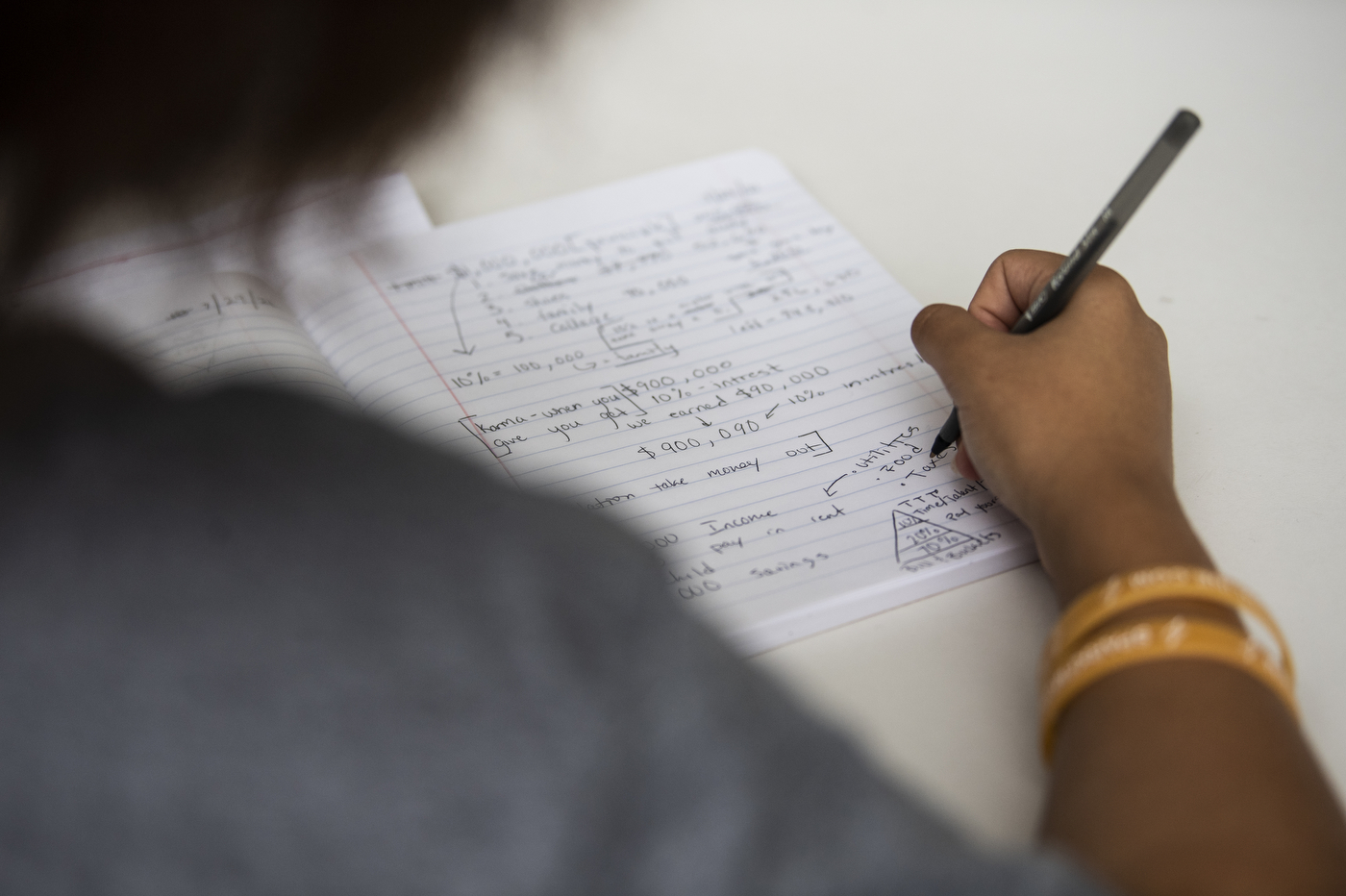 A student takes notes.