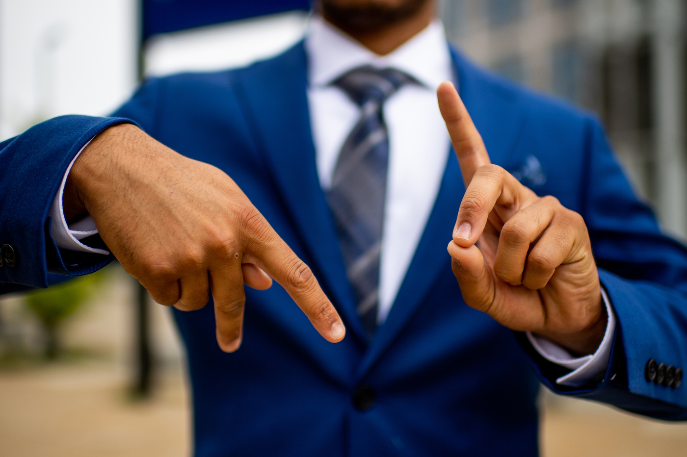 mohamed abanoor uses sign language to explain how he plans to advocate for the deaf community