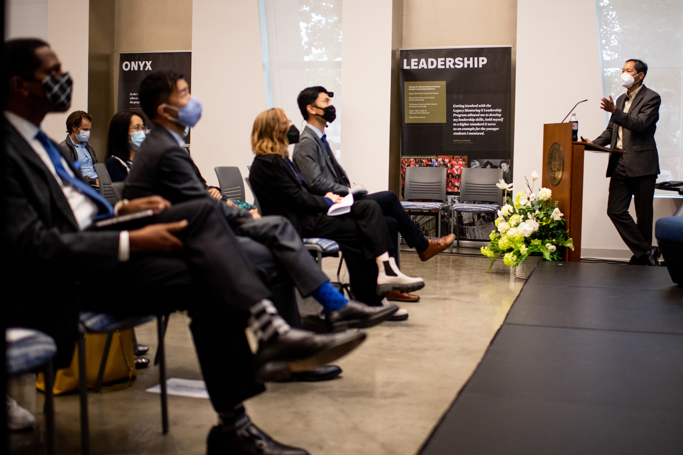 man speaking at the asian america and the world lecture