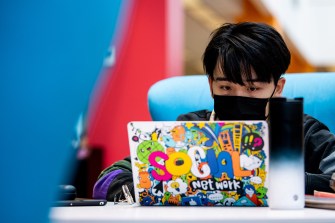 student working on laptop