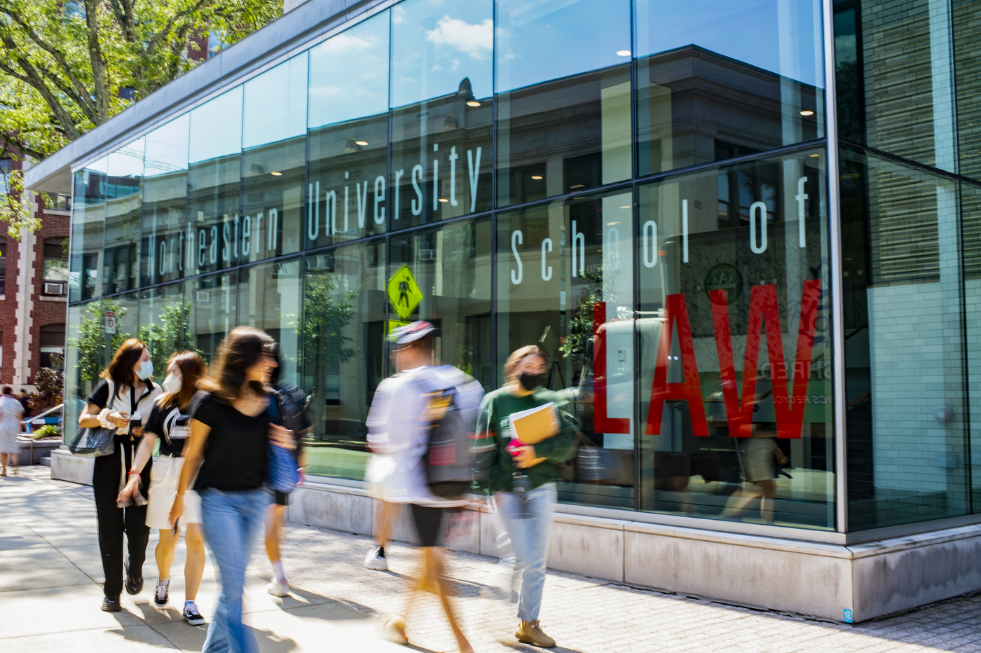 Students walking by Northeastern Law School