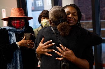 two woman hugging