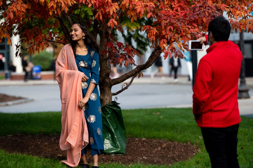 woman wearing blue and coral saree for diwali