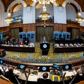 delegates sitting in international criminal courtroom