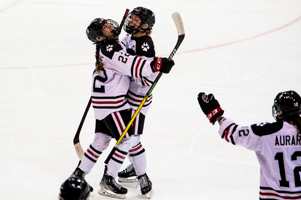 The Huskies celebrate a goal.