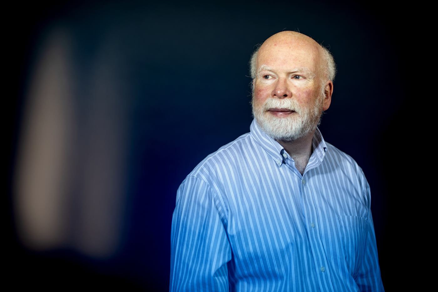 Professor Bob Triest poses for a portrait. 