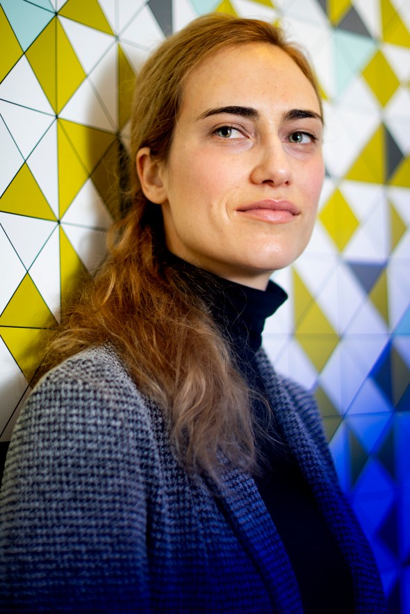 woman wearing turtleneck and blazer