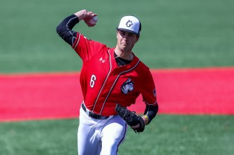 Cam Schlittler throws a pitch for Northeastern