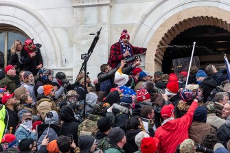 large group of violent protestors at the capitol building