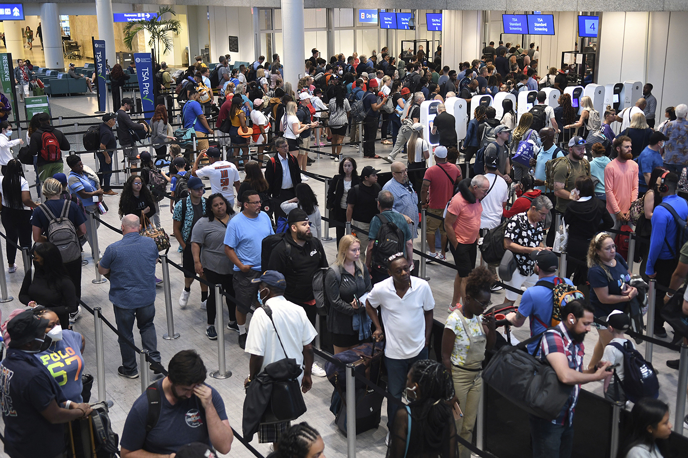 Long lines of people waiting to go through the TSA