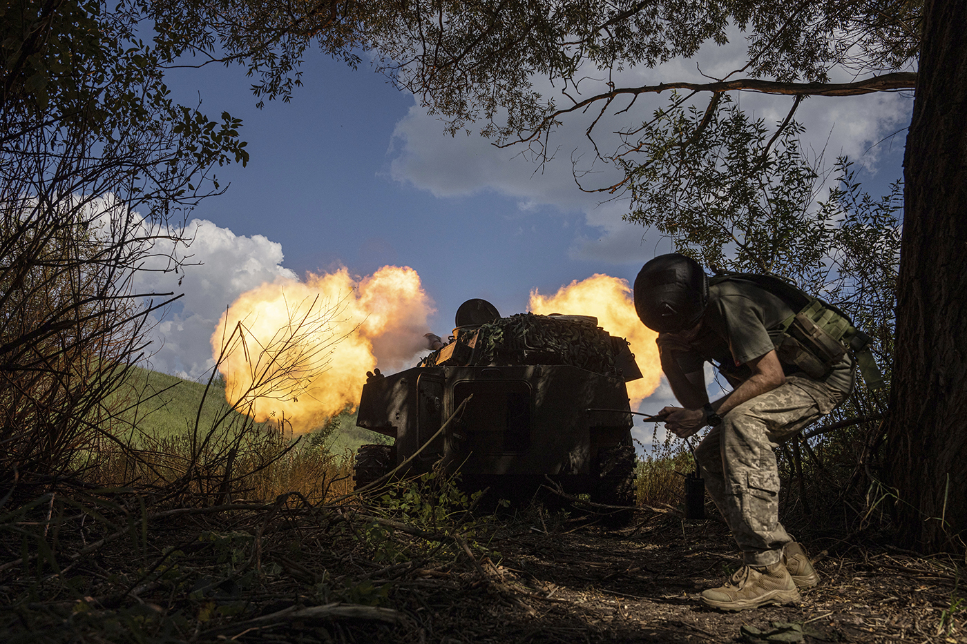 Soldiers firing weapons