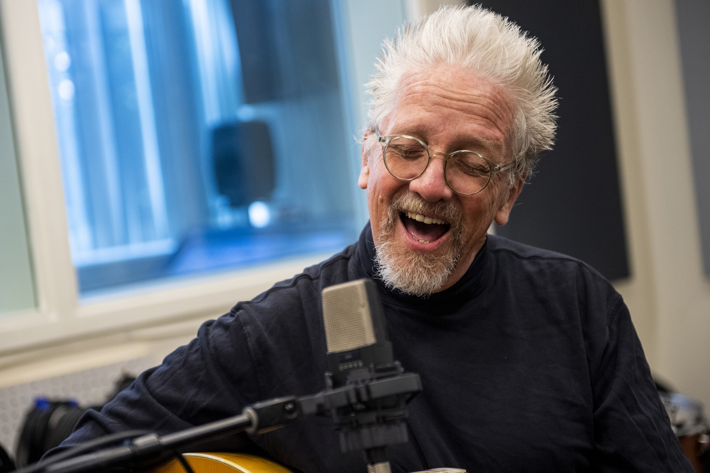 David Herlihy, former frontman for the O Positive band, sings to some music.