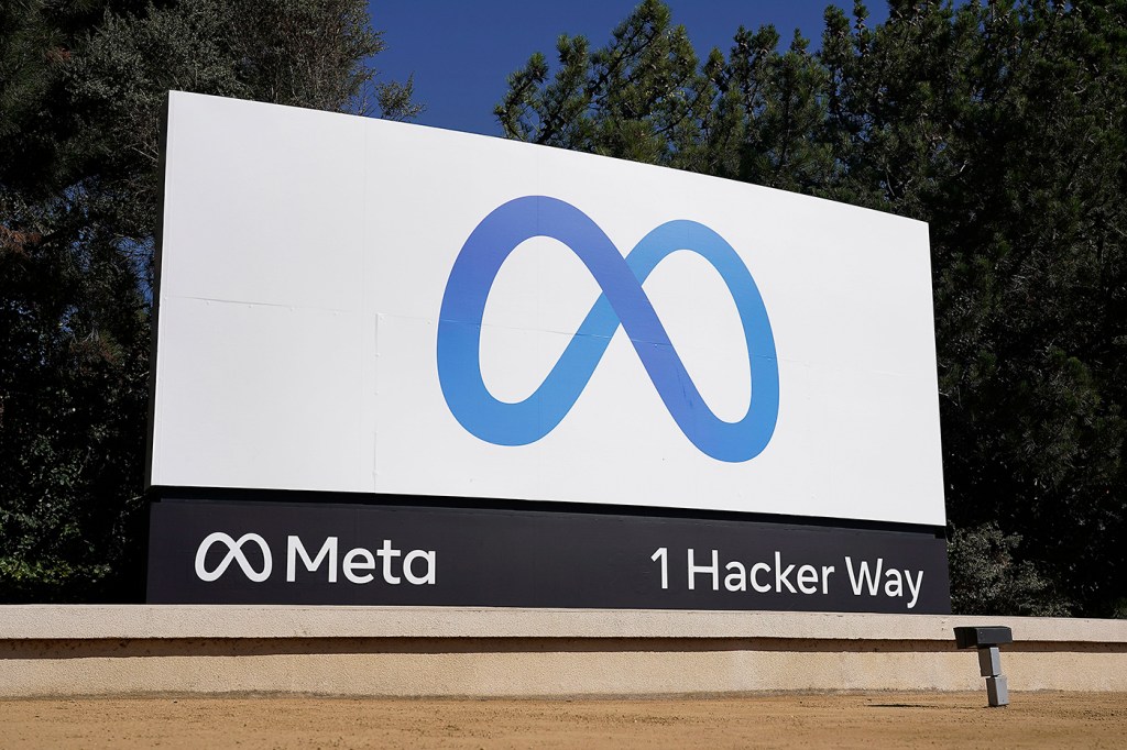 The Facebook meta logo displayed on a large sign outside the company's headquarters