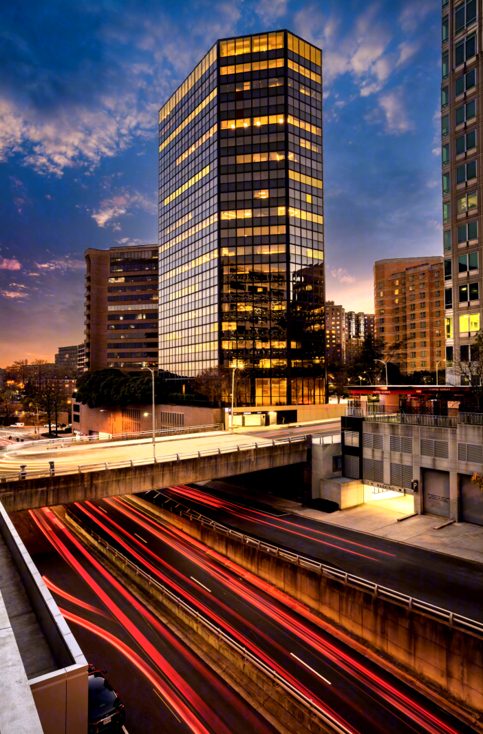 A building in the city lit up at night