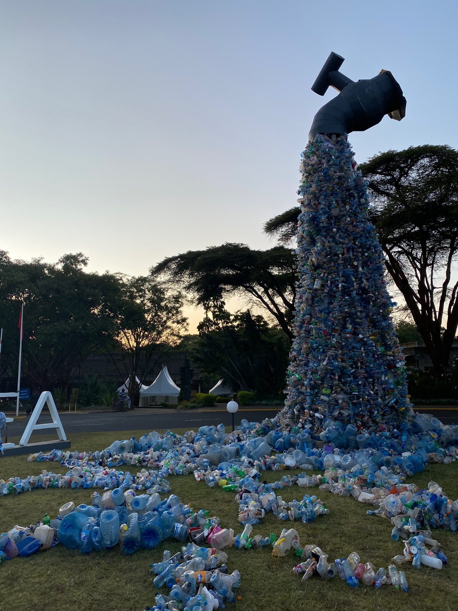 Art installation tower made of plastic pollution. 