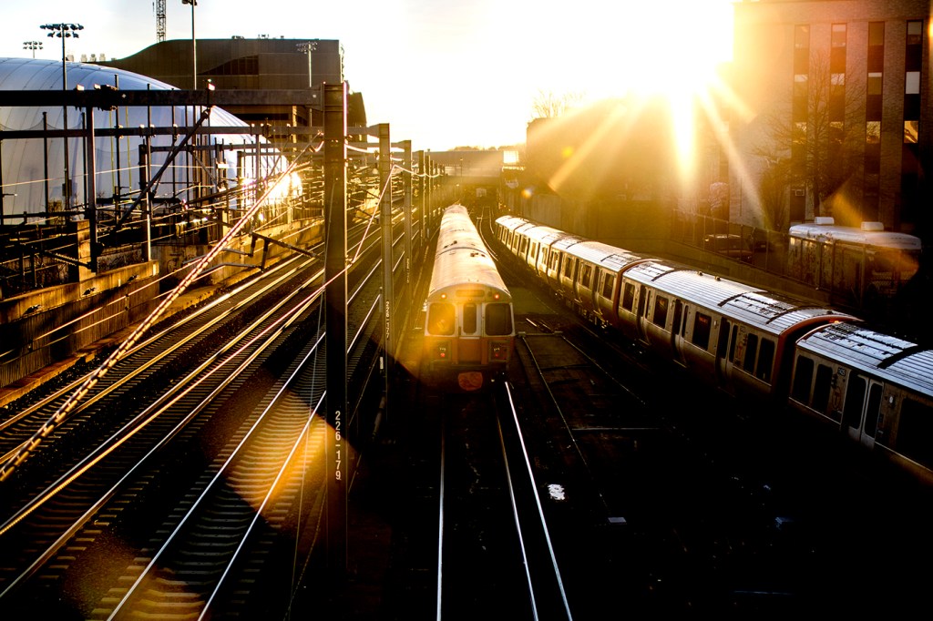 subway trains at sunset