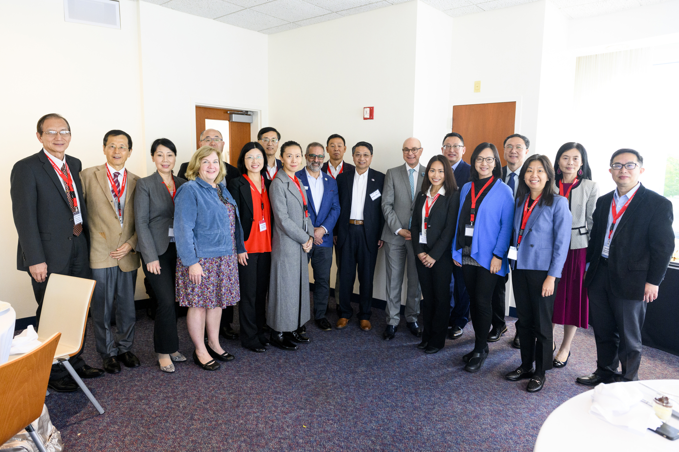 Group of CCADP members and Northeastern President posing for group photo