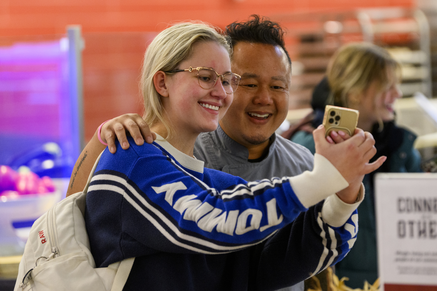 chef jet tila taking a selfie with a student