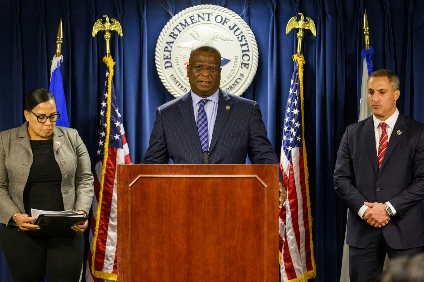 Michael Cox speaking at the podium