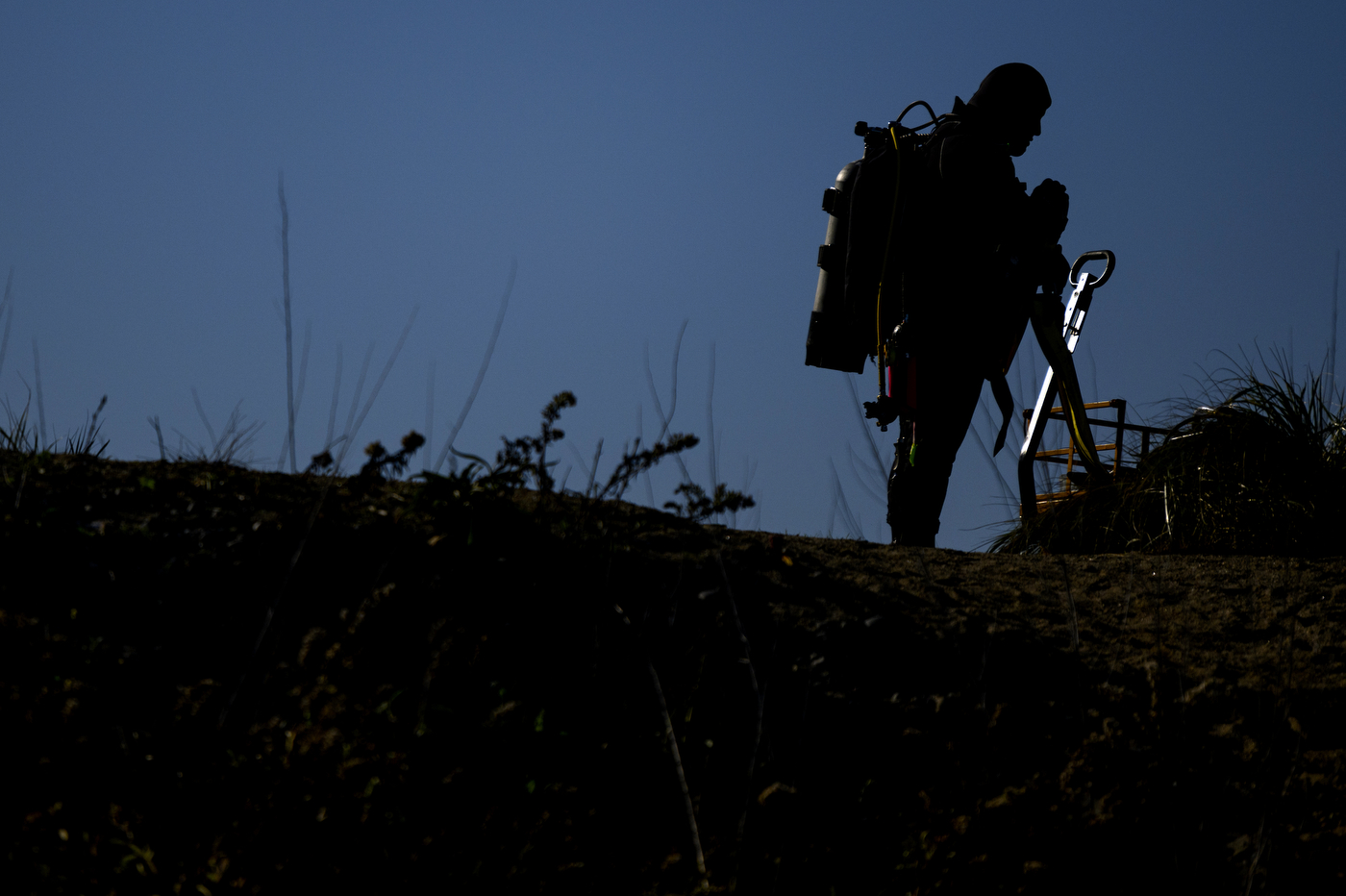 silhouette of a scuba diver