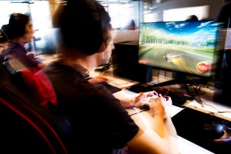 person gaming at a computer