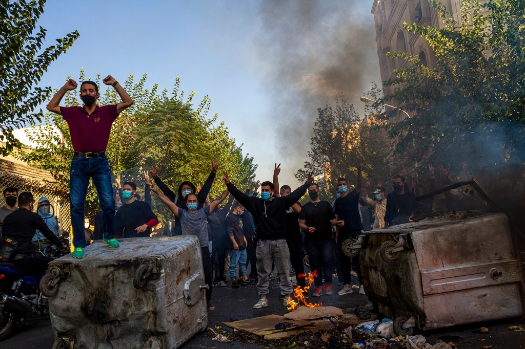 Iranians protests the death of 22-year-old Mahsa Amini after she was detained by the morality police in Tehran.