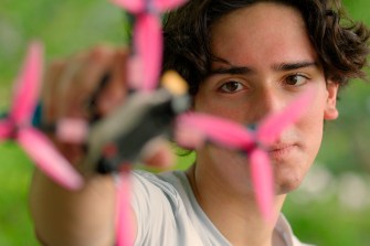 person holding drone up