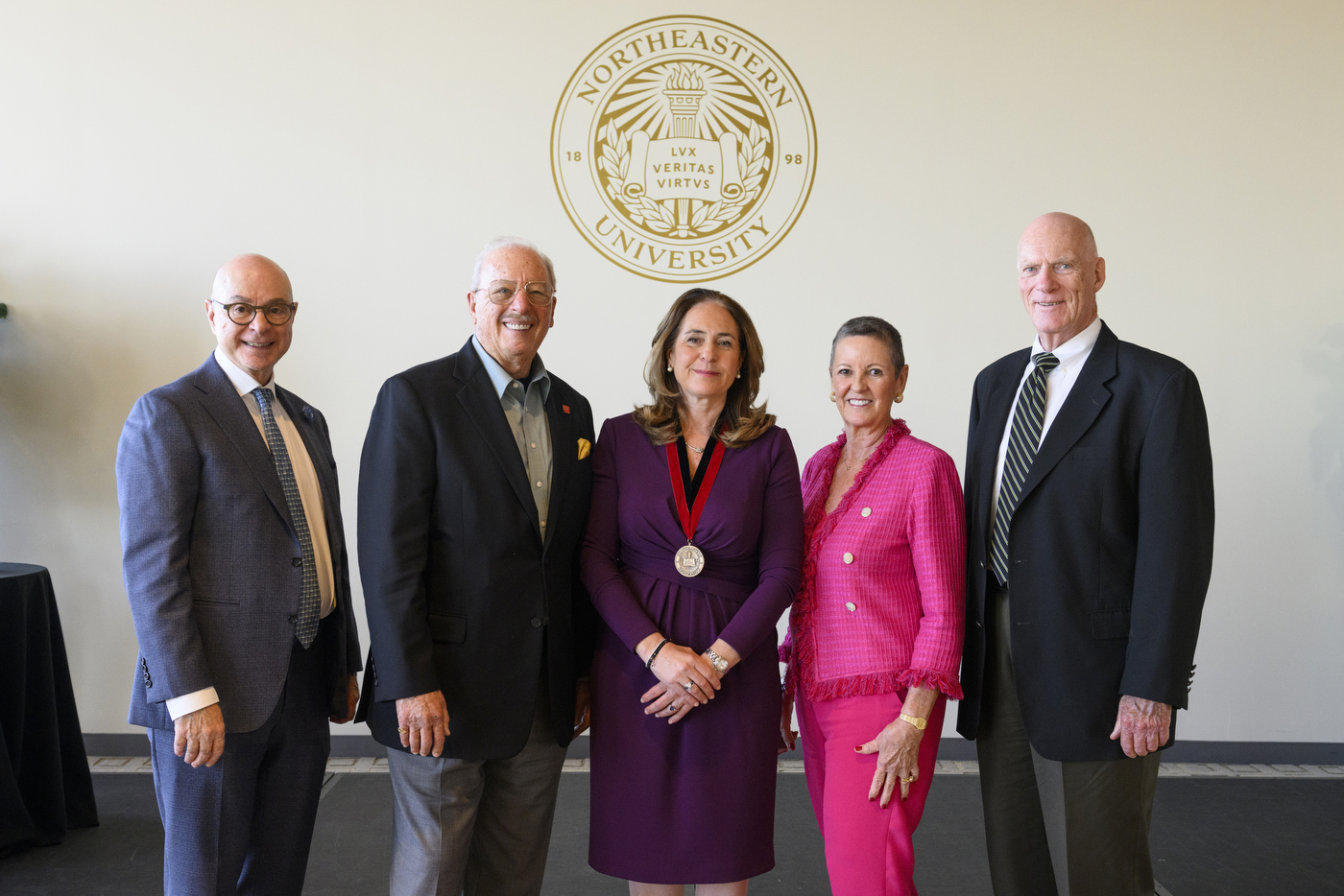 ruth v aguilera posing with four other people