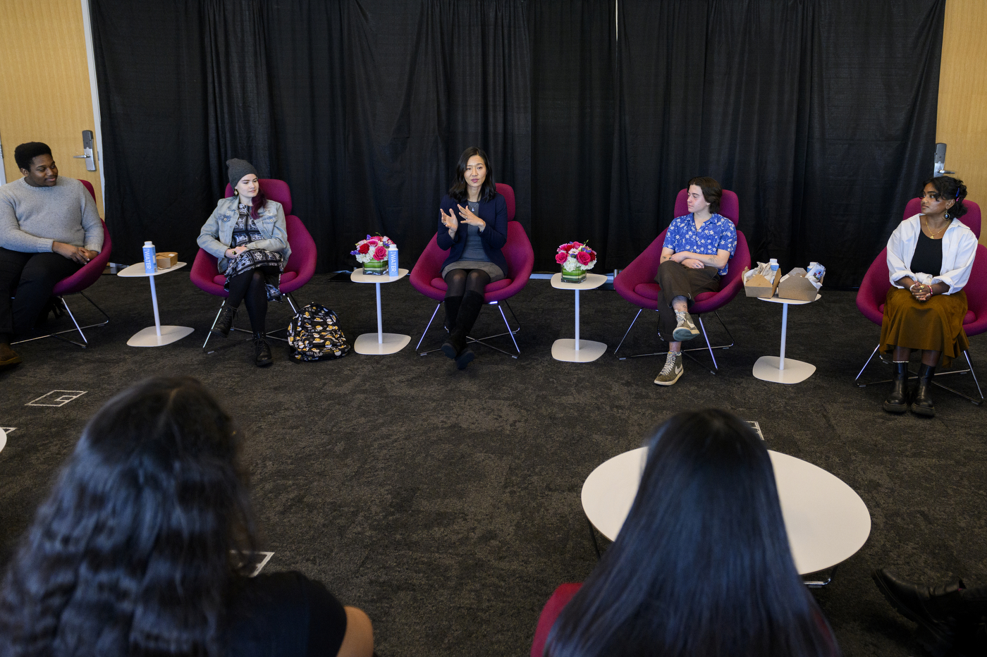 mayor michelle wu speaking in a room full of students