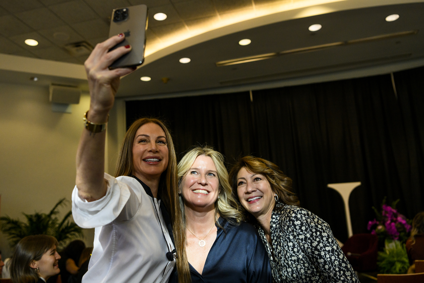 Three women taking a selfie